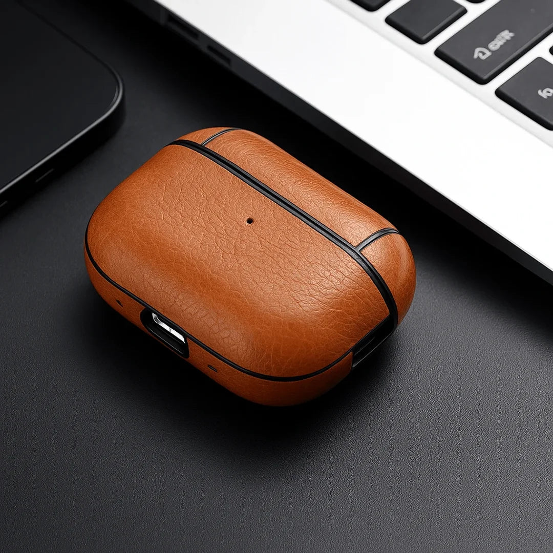 Leather AirPods case on a desk